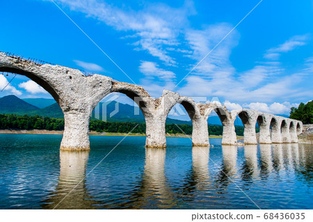 Summer landscape of Taushubetsu River Bridge in Kamishihoro Town, Hokkaido 68436035