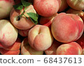Freshly picked peach close-up 68437613