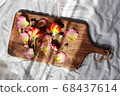 Rose background lined up on a wooden board 68437614