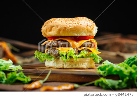 Closeup on classic cheeseburger 68441473