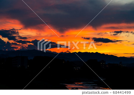 Summer sunset, tropical night feeling, sun lit up Summer sunset, tropical night feeling, sun lit up 68441499