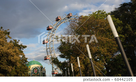 VIENNA, AUSTRIA - AUGUST 16, 2019 -  Ferris Wheel at Amusement Park Prater on August 16, 2019 in Vienna, Austria 68442105