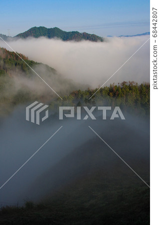 Sea of clouds in the mountains Sea of clouds in the mountains 68442807
