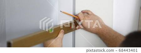 Persons hand measuring distance Persons hand measuring distance 68443401
