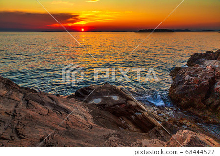 Sea landscape at sunset from Primosten town. Sea landscape at sunset from Primosten town. 68444522