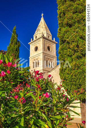 Bell tower of St George Church in Primosten town. Bell tower of St George Church in Primosten town. 68444534