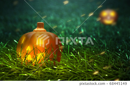 Jack-o-Lantern on the green grass with sparks 68445149