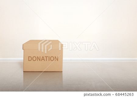 Donation box for collecting donations on the floor Donation box for collecting donations on the floor 68445263