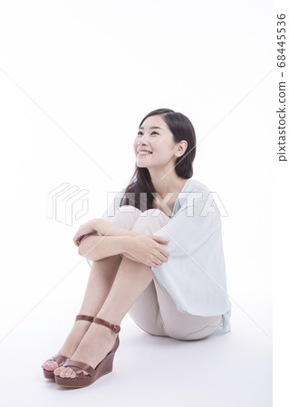 Sports gymnastics sitting 68445536