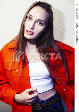 young pretty woman with blond hair on white background, sensual makeup, fashion look, lifestyle people concept 68448523