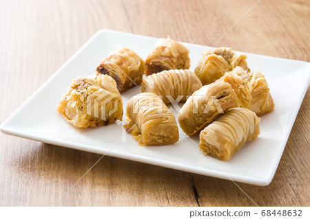 Turkish dessert baklava on wooden table	 68448632