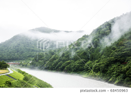 Mountain and river landscape cloudy in bad weather 68450963