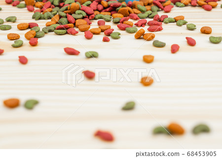 Dry food for pets on wooden background. 68453905