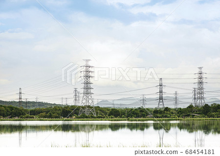 High voltage cable From the power plant at noon passing by the countryside High voltage cable From the power plant at noon passing by the countryside 68454181