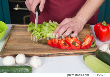 Be careful with knife. Chef teaches how quickly Be careful with knife. Chef teaches how quickly 68454760