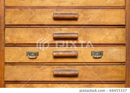 Old wooden cabinet with drawers Old wooden cabinet with drawers 68455337