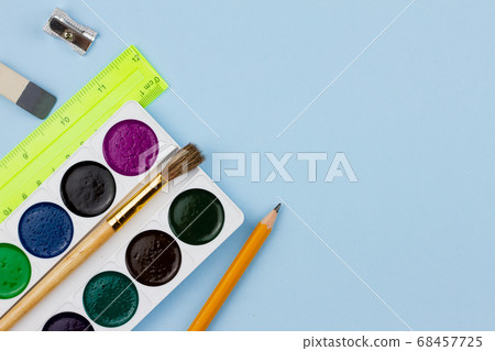 Drawing set on a light blue background. 68457725