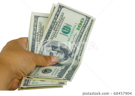 Female hand with one hundred dollars banknotes 68457904