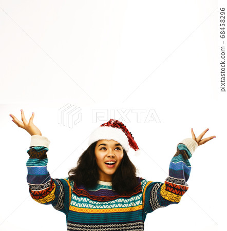 cute young real african real hipster girl in santas red hat isolated on white background waiting for winter Christmass 68458296