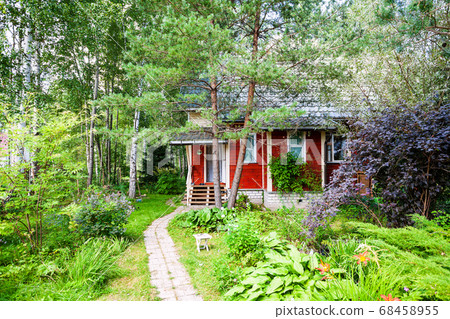 wooden summerhouse in ornamental garden in Russia wooden summerhouse in ornamental garden in Russia 68458955