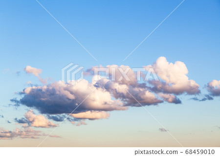 white clouds in blue sunset sky in summer white clouds in blue sunset sky in summer 68459010