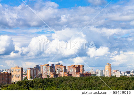 large white clouds over city and park in summer large white clouds over city and park in summer 68459016