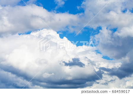 large white and gray clouds in blue sky large white and gray clouds in blue sky 68459017