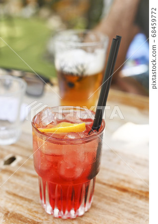 Aperol. Traditional Italian cocktail. Summer drinks concept. Soft focus. Aperol. Traditional Italian cocktail. Summer drinks concept. Soft focus. 68459772