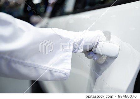 Close up hand wearing glove prevents coronavirus outbreak Close up hand wearing glove prevents coronavirus outbreak 68460076