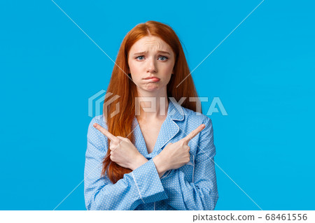 Disappointed and sad girl missed great opportunity, special discounts for beauty products, frowning cross hands on chest and pointing sideways, left and right choices, express regret or jealousy 68461556