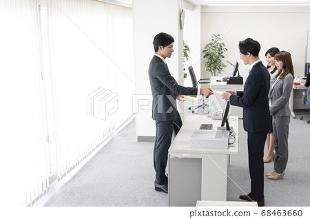 Young employees receiving special bonus Young employees receiving special bonus 68463660