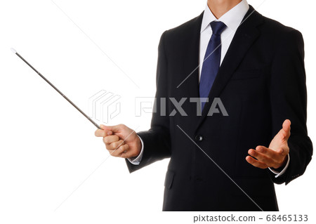 A businessman with a pointer 68465133