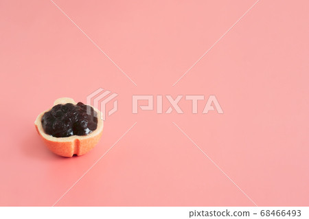 Japanese sweets: bean paste and skin of monaka (a type of Japanese wafer) - cross section of a cute Japanese sweet 68466493