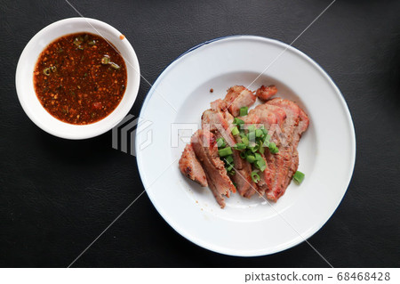 grilled pork , pork steak or sliced pork grilled pork , pork steak or sliced pork 68468428