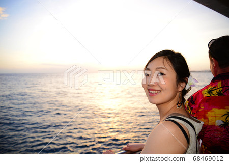 Hawaii Oahu Sunset and Woman Hawaii Oahu Sunset and Woman 68469012