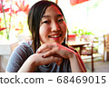 Woman taking a rest at a restaurant during a date 68469015