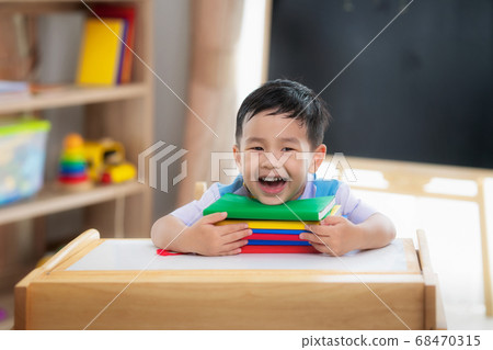 Asian student happy after back to school and smile Asian student happy after back to school and smile 68470315