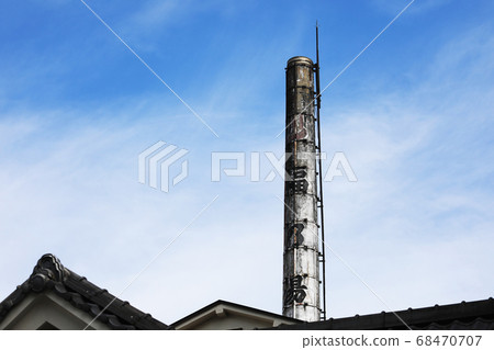 A chimney of a public bath A chimney of a public bath 68470707