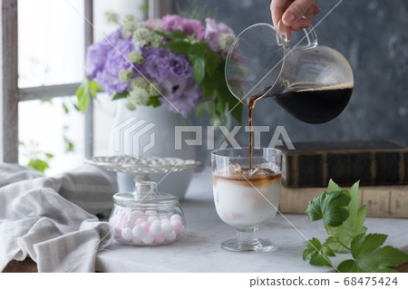Cafe au lait on the table 68475424