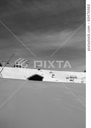 Snowy ski track prepared with snow grooming Snowy ski track prepared with snow grooming 68476868