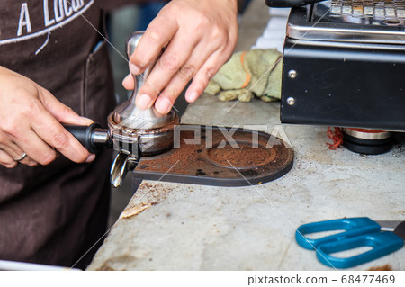 Coffee pouring machine close up in modern cafe 68477469