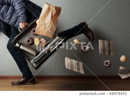 The man runs and loses the contents of his The man runs and loses the contents of his 68478451