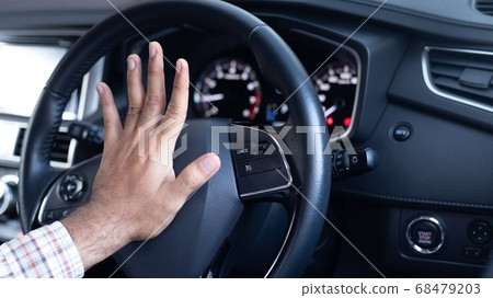 Angry driver is honking a Angry driver is honking a 68479203