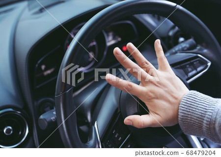 Angry driver is honking a Angry driver is honking a 68479204