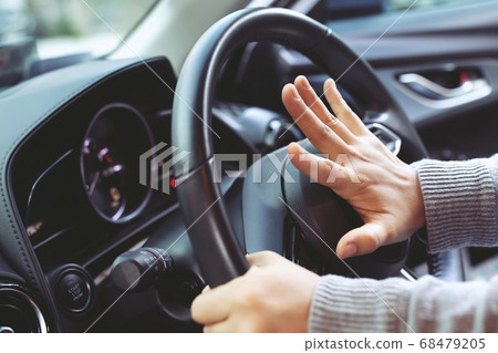 Angry driver is honking a Angry driver is honking a 68479205