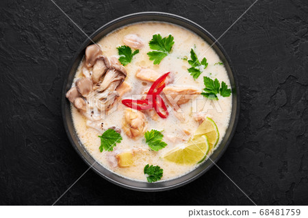 Tom Kha Gai or Thai Coconut Chicken Soup in black bowl Tom Kha Gai or Thai Coconut Chicken Soup in black bowl 68481759