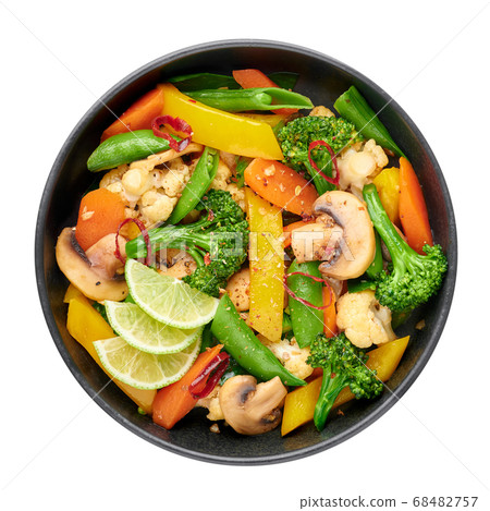 Pad Pak Ruam or Veg Thai Stir-Fried Vegetables in black bowl isolated on white Pad Pak Ruam or Veg Thai Stir-Fried Vegetables in black bowl isolated on white 68482757