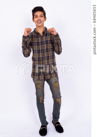 Portrait of young handsome Indian teenage boy Portrait of young handsome Indian teenage boy 68485655