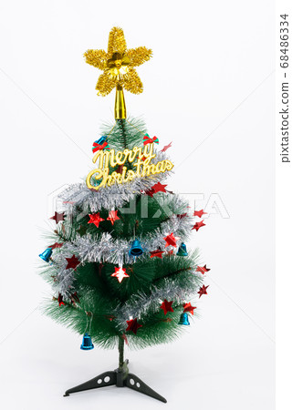 Christmas tree with Merry Christmas text against white background Christmas tree with Merry Christmas text against white background 68486334