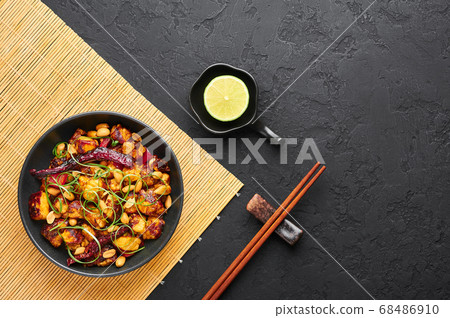Kung Pao Paneer at black slate background. Kung Pao Paneer at black slate background. 68486910